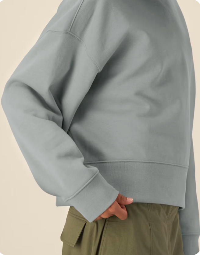 Le sweat à capuche unisexe coupe Boxy en coton recyclé