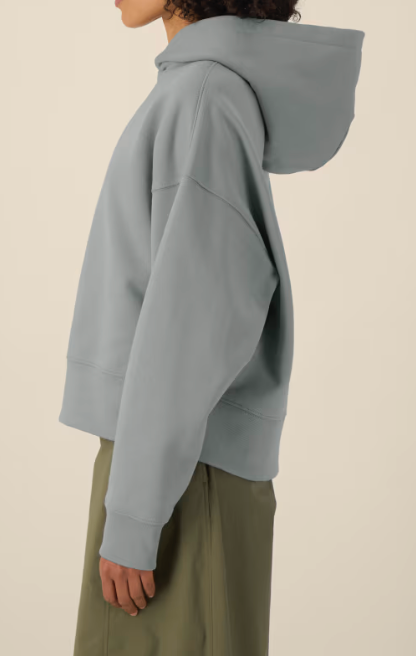 Le sweat à capuche unisexe coupe Boxy en coton recyclé