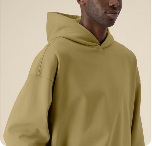 Le sweat à capuche unisexe coupe Boxy en coton recyclé